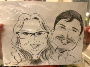 A caricature of Nicole and Andrew from their trip to Cold Spring Harbour Labs in New York