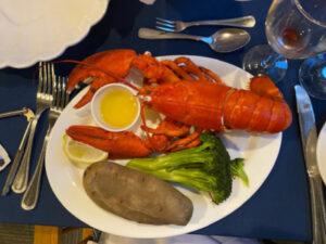 Lobster dinner with broccoli and potato